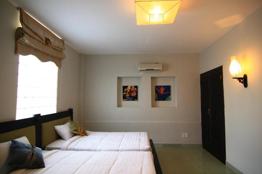 Faifoo Boutique Hotel Ho Şi Min Oda fotoğraf