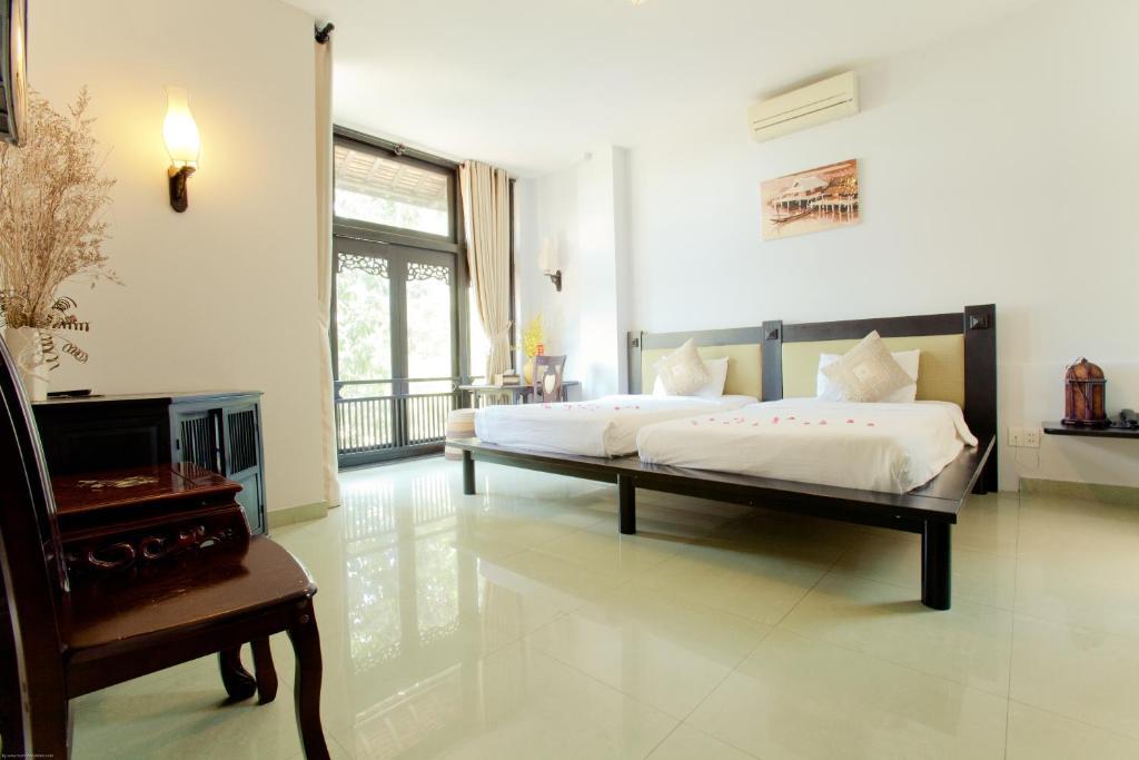 Faifoo Boutique Hotel Ho Şi Min Oda fotoğraf